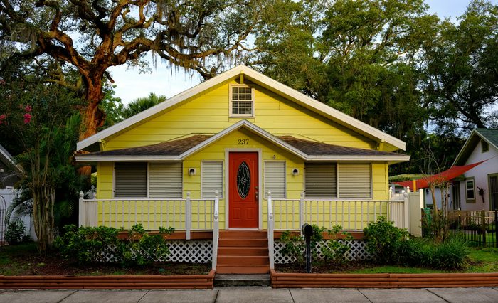 Yellow Florida bungalow ready for a home valuation